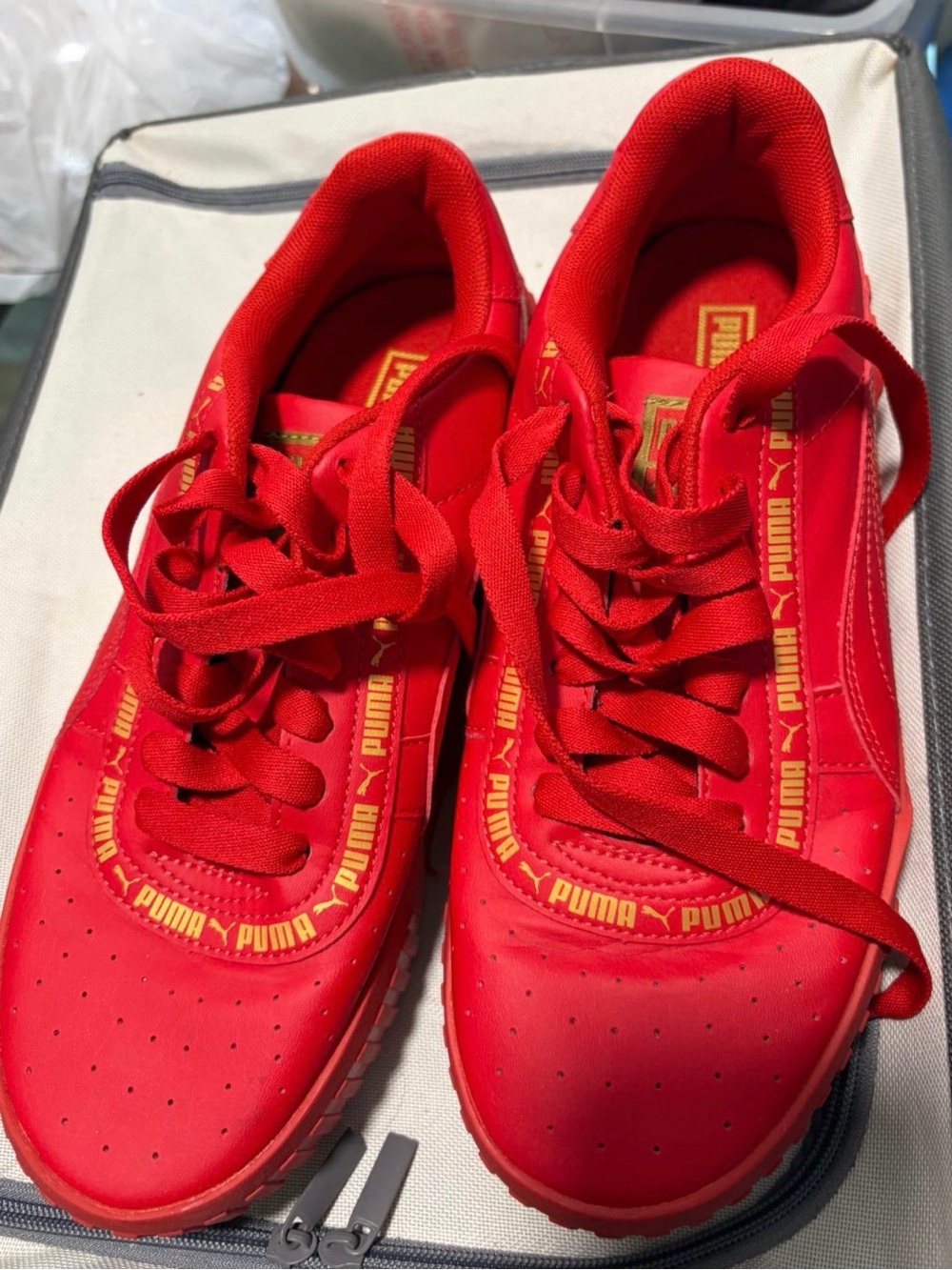 Puma Red Athletic Sneakers with Gold Logo Trim